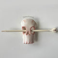 Skull and bones Barrette